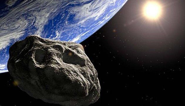 К Земле летит огромный астероид: чего ждать? На картинке оба небесных тела